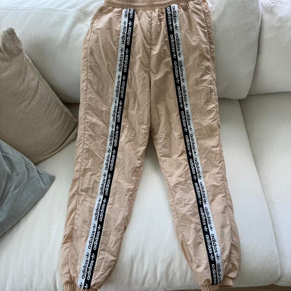 Adidas tan track pants with